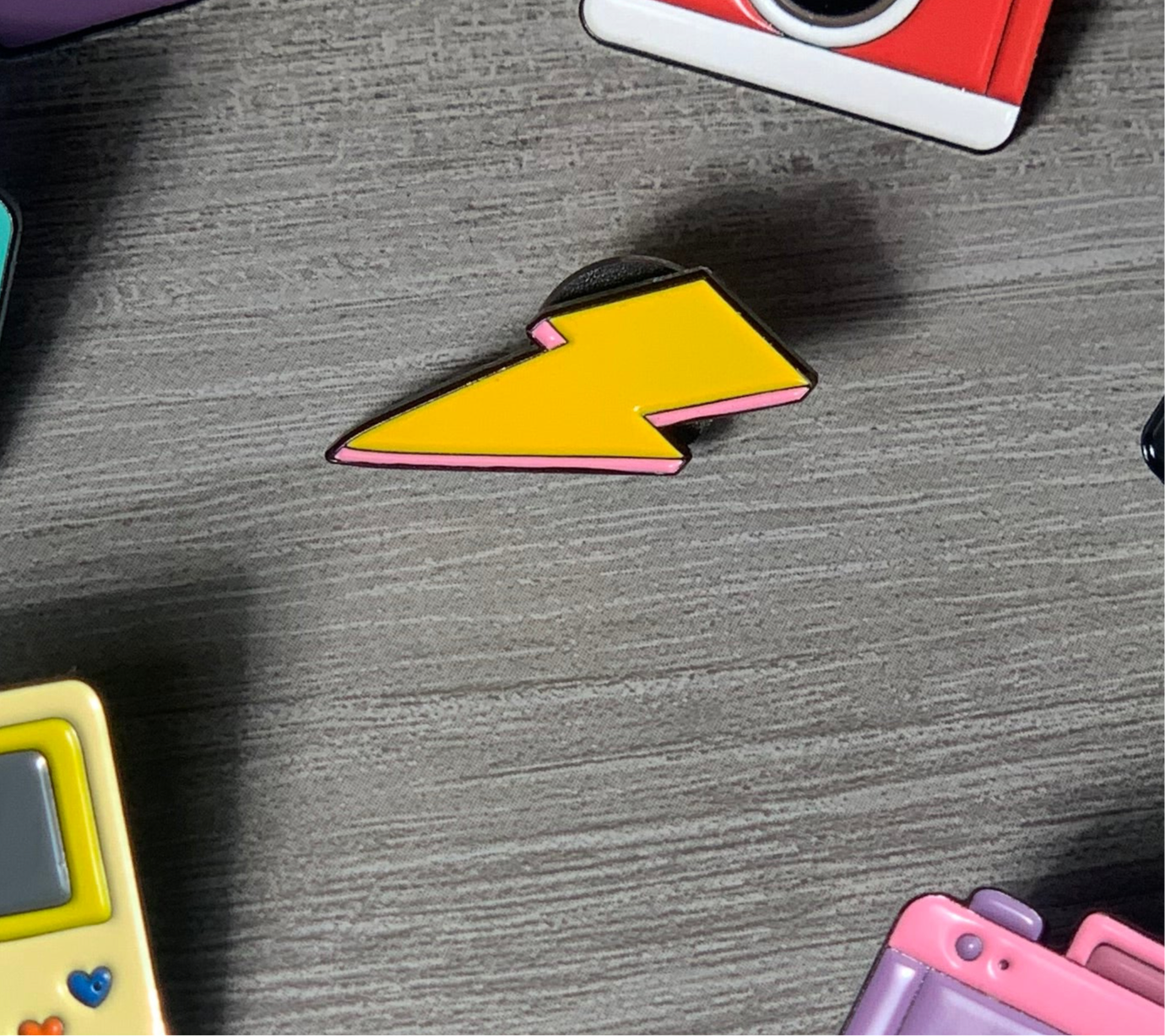 Yellow Lightning Enamel Pin – Mini Bolt Streetwear Accessory